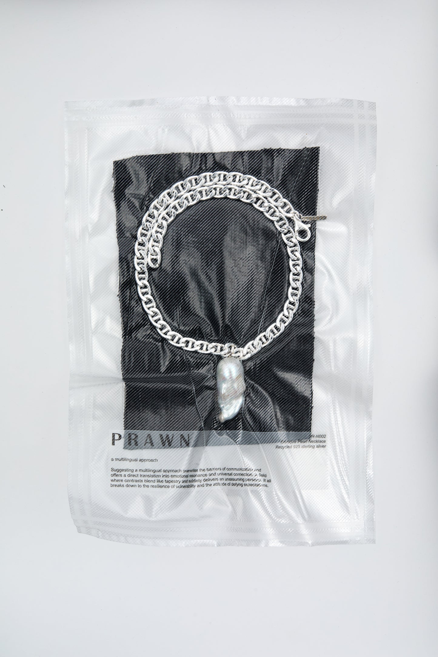 Large baroque pearl pendant on a chunky silver chain