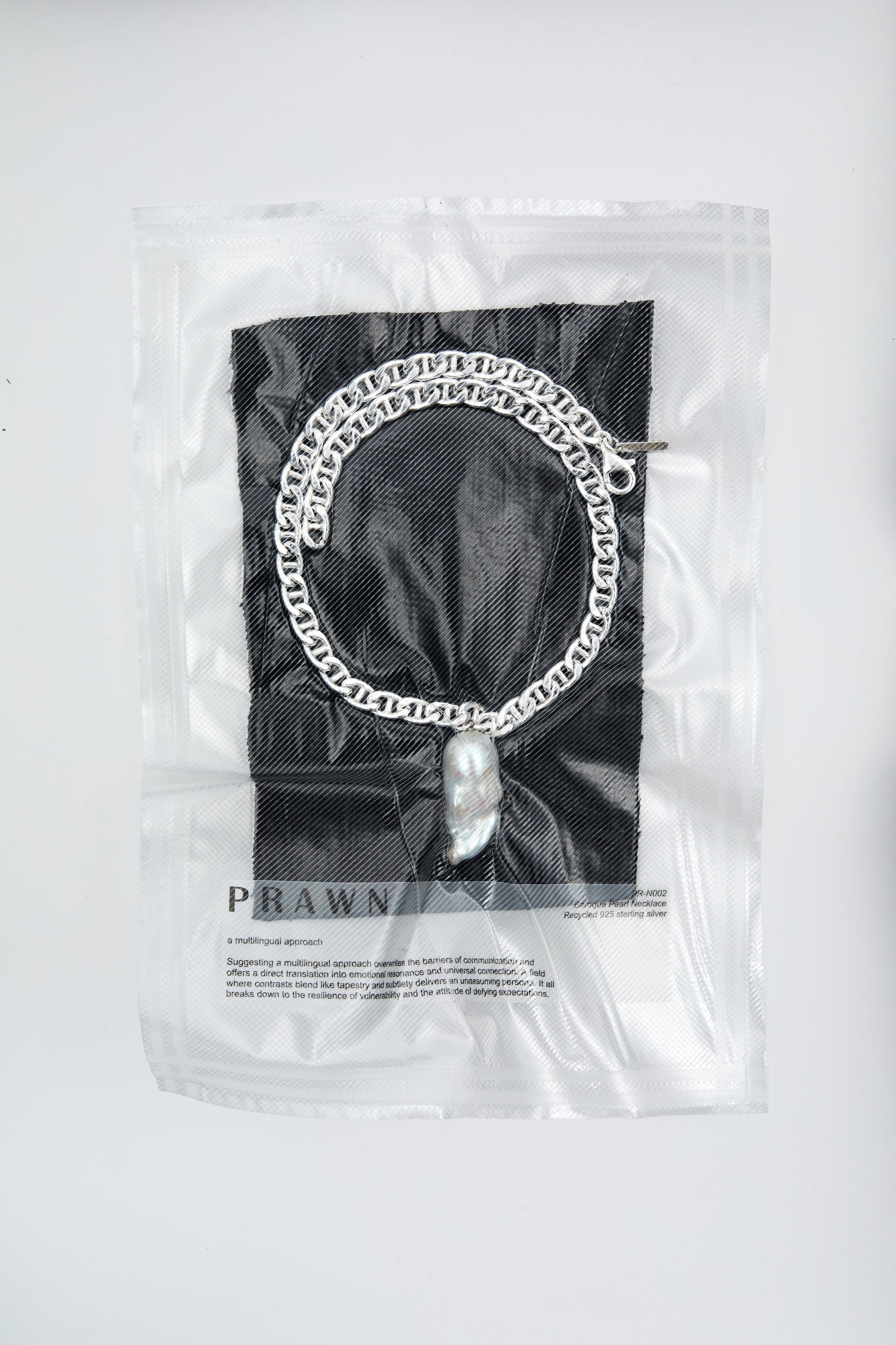 Large baroque pearl pendant on a chunky silver chain