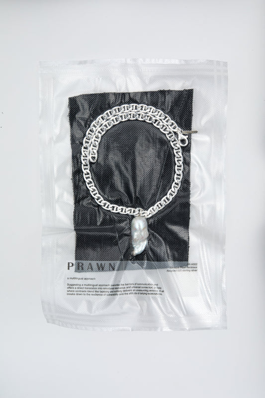 Large baroque pearl pendant on a chunky silver chain