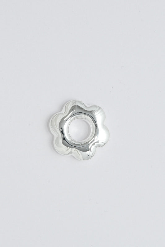 Puffy silver flower pendant