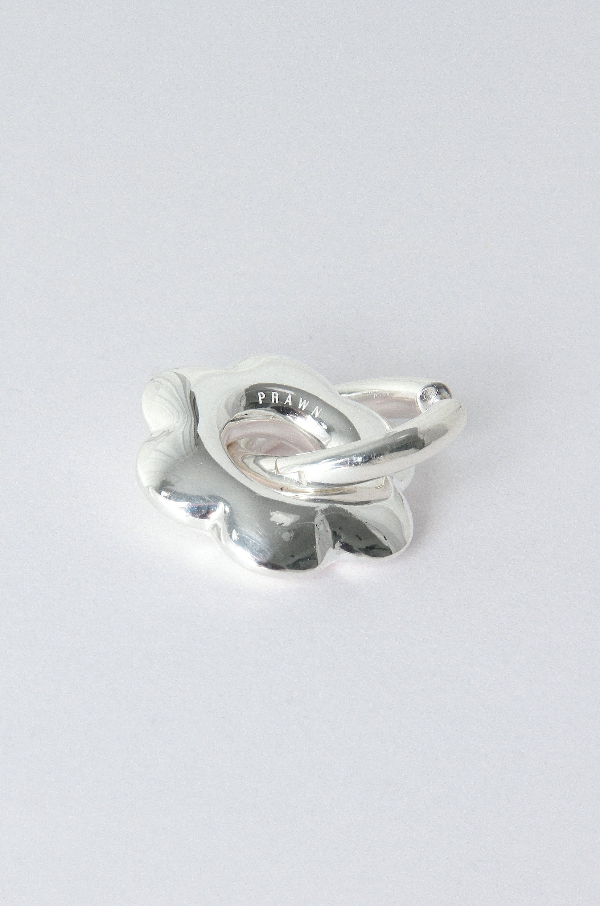 Puffy flower, silver hoop earring 