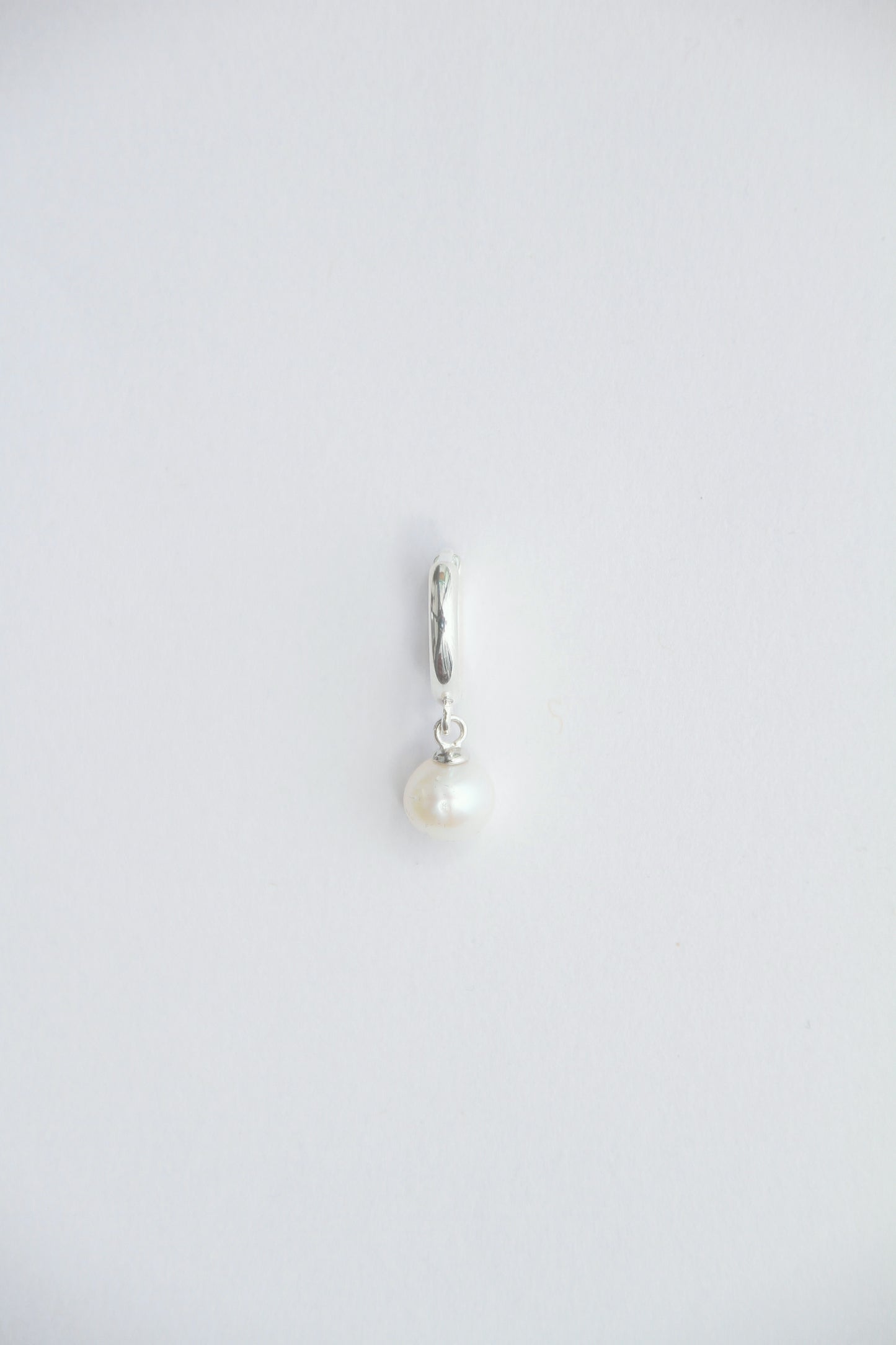 ROUND PEARL HUGGIE EARRING