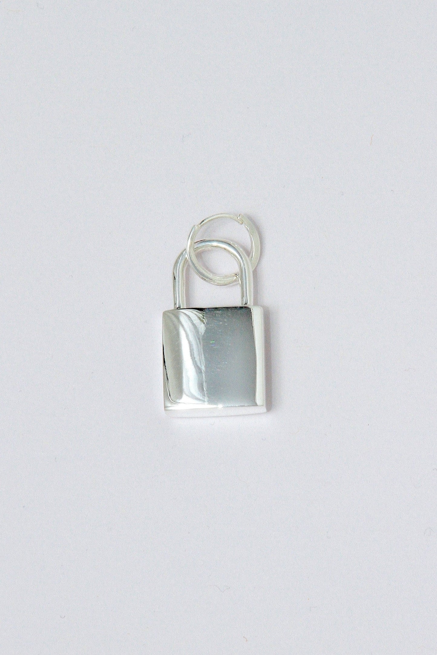 Silver padlock hoop earring
