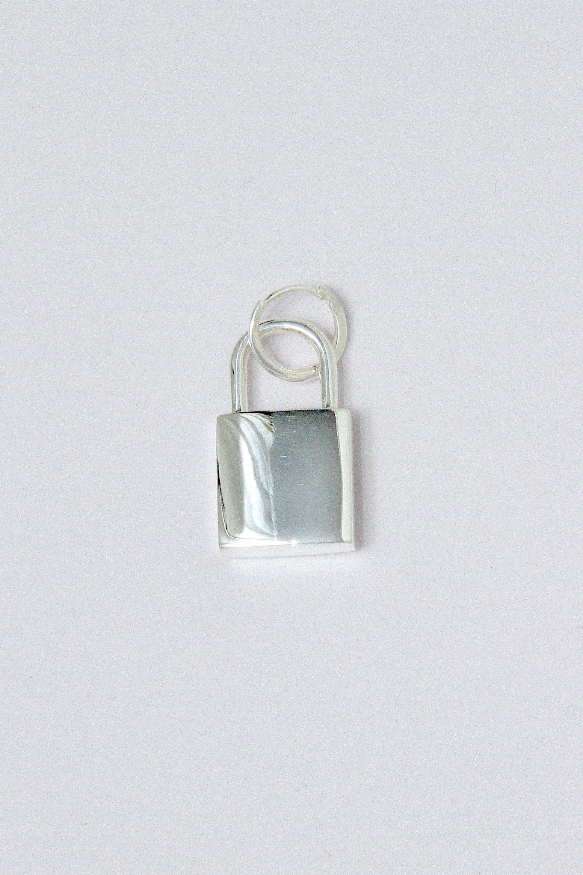 Silver padlock hoop earring
